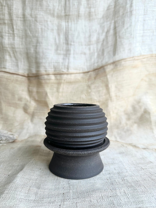 58 black mini pedestal saucer set