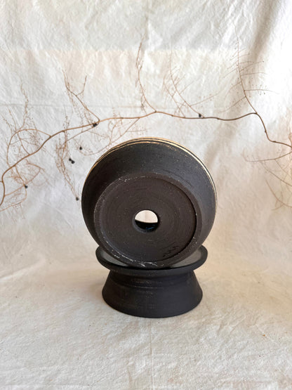 9 black/sand pedestal saucer set