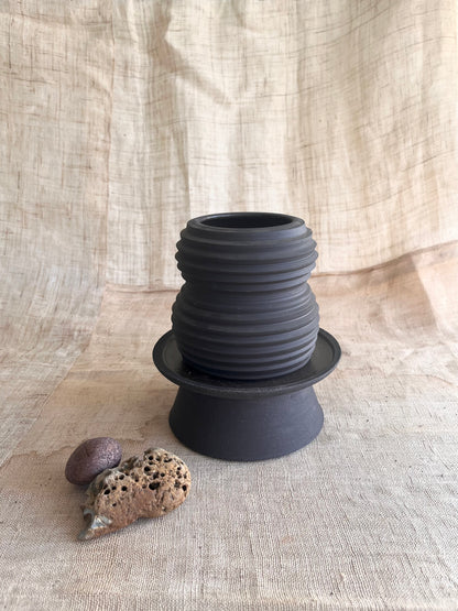 11 black pedestal saucer set