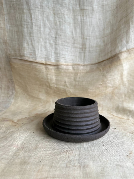 38 unglazed small black pagoda planter